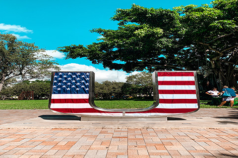 American flag on the U Statue for Veterans Week.